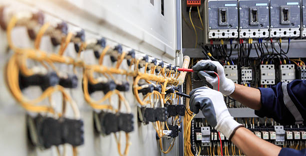 Professional Electrician technician working in Manitou Beach-Devils Lake, MI